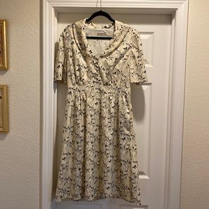 ** YEP, it has POCKETS! **
Owl/bow dress pattern off white. I love the buttons!